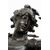 Antique patinated bronze sculpture depicting the "Nimphe de bois" signed "Louis Moreau" resting on a red Levanto marble base. France 19th century.