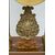 Antique Charles X clock in precious exotic woods. France, 19th century.