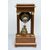 Antique Charles X clock in precious exotic woods. France, 19th century.