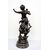 Antique patinated bronze sculpture depicting the "Nimphe de bois" signed "Louis Moreau" resting on a red Levanto marble base. France 19th century.