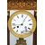 Antique Charles X clock in precious exotic woods. France, 19th century.