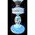 Milk glass oil lamp with light blue decoration and floral motifs. Kosmos Brenner manufacture. Germany.