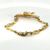 Bracciale in oro con smeraldi e diamanti