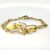 Bracciale in oro con smeraldi e diamanti