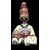 Ceramic figure depicting a Japanese character. Articulated head.