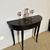 Antique Louis XVI half-moon console/table from the late 1700s, black lacquered, Siena. Measurements: 89 x 34 cm, height 71 cm.