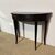 Antique Louis XVI half-moon console/table from the late 1700s, black lacquered, Siena. Measurements: 89 x 34 cm, height 71 cm.