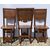 Six friar chairs in solid walnut. Friuli, 17th century.