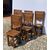 Six friar chairs in solid walnut. Friuli, 17th century.