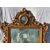 Carved and gilded wood mirror. Venice, 18th century.