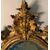 Carved and gilded wooden mirror. Northern Italy, 18th century.