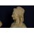 Pair of 19th-century French terracotta busts resting on circular marble bases, signed on the back.