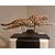 Painted ceramic cheetah with a high-class base: elegance and character