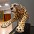 Painted ceramic cheetah with a high-class base: elegance and character