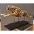 Painted ceramic cheetah with a high-class base: elegance and character
