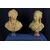 Pair of 19th-century French terracotta busts resting on circular marble bases, signed on the back.
