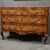 Elegant 18th-century Emilian chest of drawers in walnut and olive wood Elegant 18th-century Emilian chest of drawers in walnut and olive wood