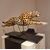 Painted ceramic cheetah with a high-class base: elegance and character