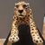 Painted ceramic cheetah with a high-class base: elegance and character