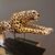 Painted ceramic cheetah with a high-class base: elegance and character