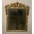 Carved and lacquered wooden mirror. Venice, 18th century.