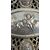 Pierced silver centerpiece with putti and figures. Holland.