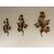 Three gilded metal sconces with floral motifs. 19th century