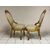 Pair of carved and gilded wooden armchairs. 19th century