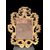 Carved and gilded wooden frame-mirror with 'cartoccio' decoration.