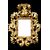 Carved and gilded wooden frame-mirror with 'cartoccio' decoration.