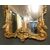 A specc218 carved and gilded mirror, mis. h cm 146 x 80     