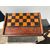 Folding chessboard in mahogany with cherry and ebony details.     