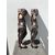 Pair of friezes-sculptures in walnut wood with male figures.     
