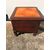 Mahogany bedside cabinet with leather-covered lifting top.     