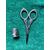 Silver scissor and thimble set with engraved geometric motifs with original box.     