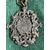 Silver-plated and perforated metal medal with rocaille plant motifs and three towers symbol of San Marino.     