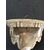 Mensola in maiolica decorata con losanghe,mascheroni e motivi vegetali in rilievo.Manifattura di Angelo Minghetti.Bologna.