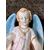 Holy water stoup in bisque porcelain depicting an angel with a shell-shaped cup. France.     