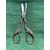 Metal midwife scissors for metal umbilical cord decorated with stylized stork.     