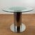 Round vintage steel and glass table from the 70s     