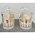 Pair of containers - pourers for wine bottles in silver plate with stylized and perforated plant motifs. United States.     