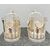 Pair of containers - pourers for wine bottles in silver plate with stylized and perforated plant motifs. United States.     