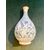 Majolica bottle with blue monochrome decoration with stylized plant motifs. Montelupo.     