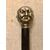 Stick with metal knob depicting 4 grotesque faces. Ebony horn.     