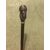 Stick with knob and ebony barrel depicting head of an Arab character.     