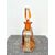 Bottiglia in vetro incamiciato e molato con motivi floreali e geometrici stilizzati art deco’.Boemia