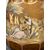 Bottiglia boemia con decoro in oro e argento raffigurante scena galante.