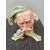 Porcelain sculpture depicting a male head with hat and pipe.Giuseppe Cappe &#39;(unsigned).     