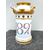 Veilleuse-tisaniera in porcelain with turret motifs and date 1827 with floral decoration.Gold lightings.France     