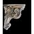 Mensolina  in terracotta con decori rocaille in rilievo con bagno galvanico argento.Manifattura Dini e Cellai.Signa.